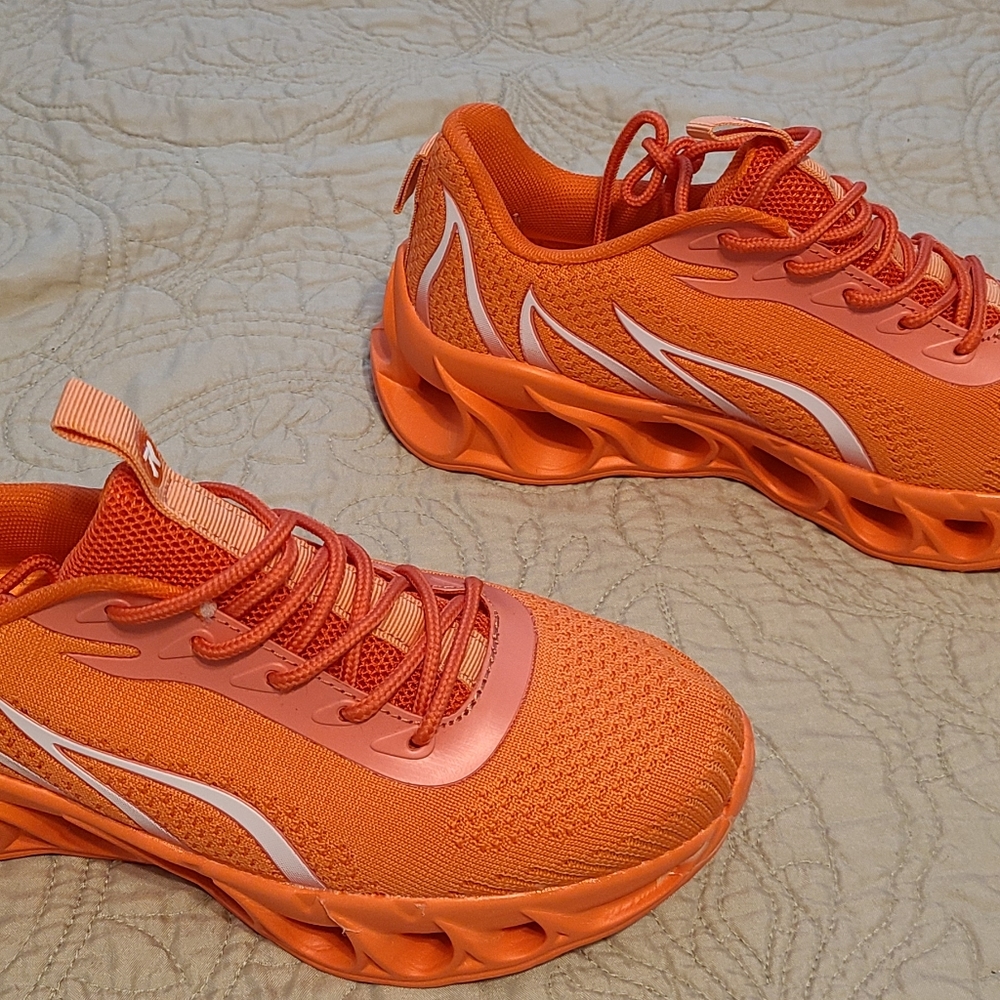 Never worn orange Sneakers